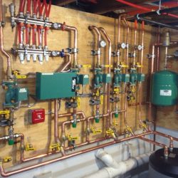 In a hydronic heating system the heat transfer medium is